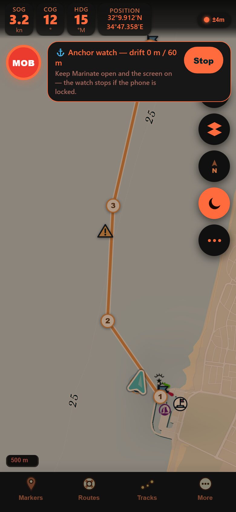 Marinate night mode off Haifa: the chart dimmed and the SOG, COG, HDG and position readouts rendered in a warm red palette